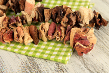 Dried mushrooms on wooden background