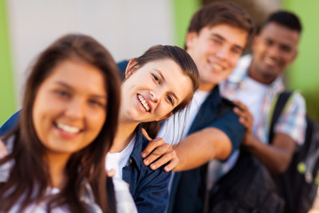 group of playful high school students