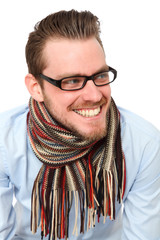 Mature young man in a blue shirt and glasses