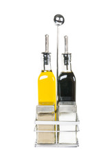 A set of salt pepper olive oil and soya sauce