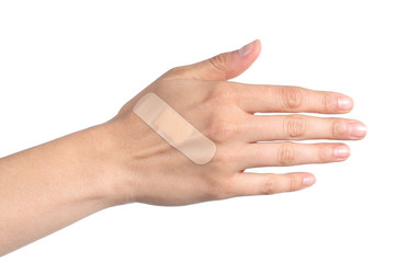 Woman hand with a band aid