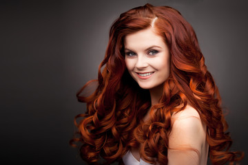 woman with red curly hair