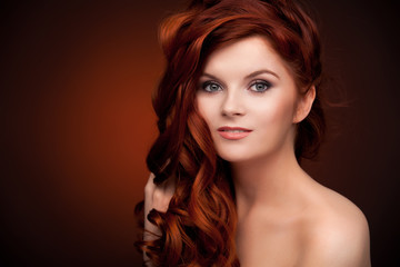 Beautiful woman with curly hairstyle