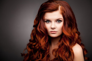 Fototapeta premium woman with red curly hair