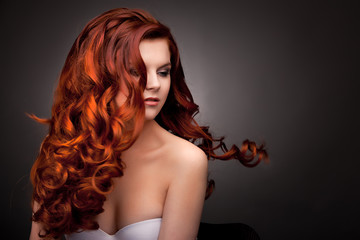 Glamour woman with long red