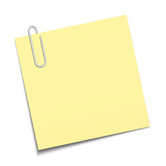Sticky note clipped with a paperclip