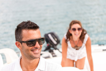 picture of happy young couple on a yacht