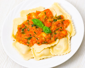 ravioli with tomato sauce and basil