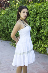 Obraz na płótnie Canvas attractive woman with summery white dress