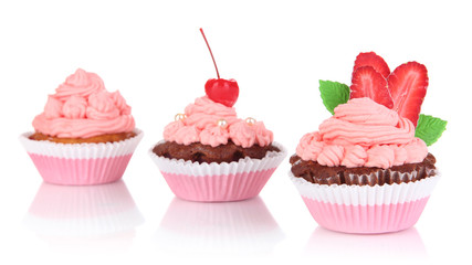 Delicious beautiful cupcakes isolated on white