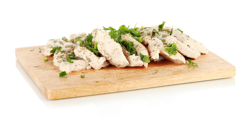 Boiled meat on board isolated on white
