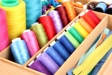 Sewing accessories in wooden box close up