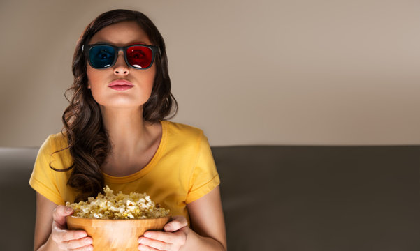 Young Woman Watching Movie At Home