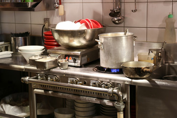 Dirty asian kitchen with unwashed noodle bowls