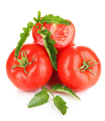 Ripe tomatoes isolated on white.