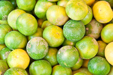 Lemons in a basket for sale