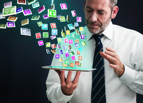 Tablet PC with cloud of application icons