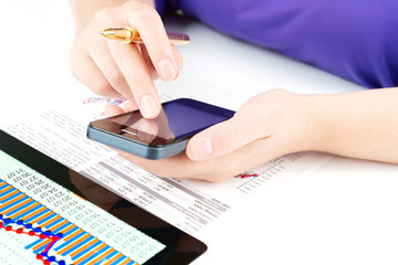 Businesswoman work with documents and tablet pc