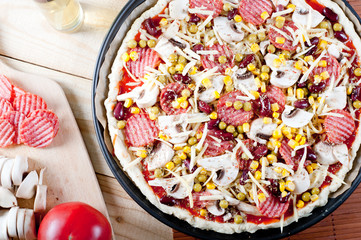 Fresh raw italian pizza