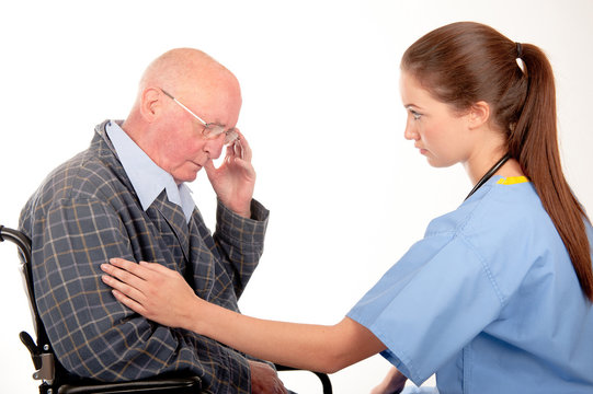 Nurse With Elderly Patient