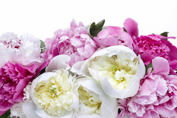 Lush peonies in white basket