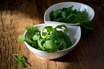 bowl of fresh green, natural arugula