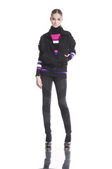 Full body young woman in casual clothes with scarf posing