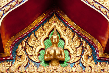 Fototapeta na wymiar Thai Traditional Painting Glass on Temple arch door