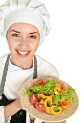 Pretty cook chief holding salad