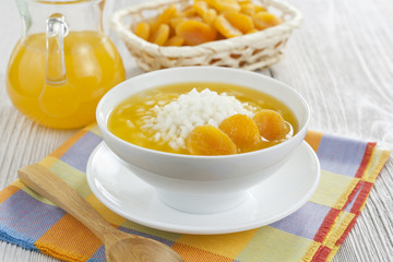 Rice soup with dried apricots