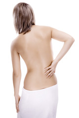 Fototapeta premium Woman massaging pain back isolated on white background