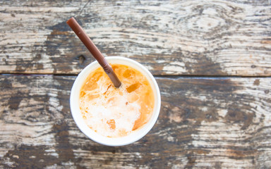 top view coffee cup and brown tube