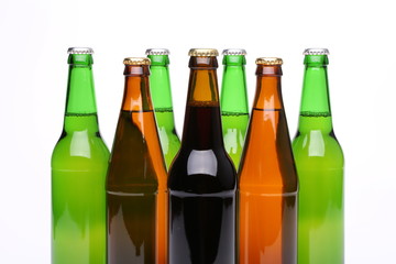 Closed bottles of beer isolated on a white background