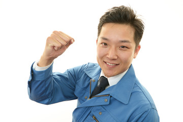 ガッツポーズの作業員