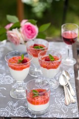 Summer fruit dessert on garden table