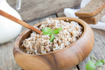 buckwheat in a wooden plate.