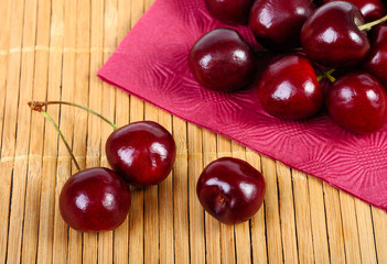 Sweet cherries on a mat