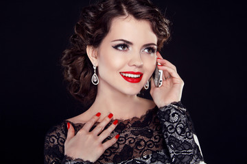 Obraz premium Happy Business woman talking on mobile phone. Fashion elegant wo