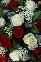 Red and white roses in a bridal bouquet