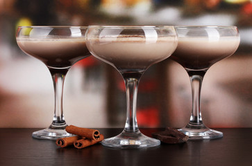 Cream cocktails on table in cafe