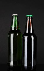 Bottles of beer on dark background