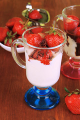 Delicious strawberry desserts in glass vase