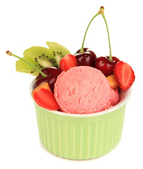 Delicious  ice cream with fruits and berries in bowl isolated