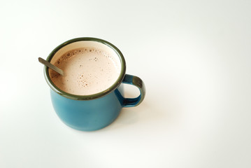 cup of hot cocoa on white background