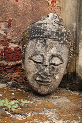 Ancient Buddha head without body in Sukhothai, Thailand