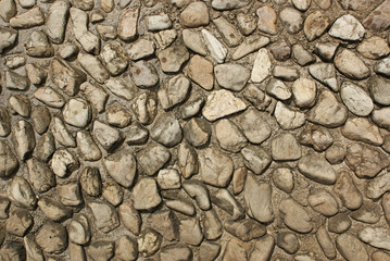 Pebble stone built and designed by embedding on ground