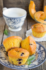 Pumpkin muffins with blueberries.
