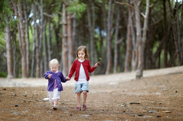 Two sisters having a walk in the woods
