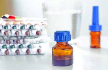 bottle, tablets and capsules