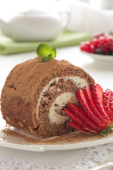 Chocolate roll with cream.